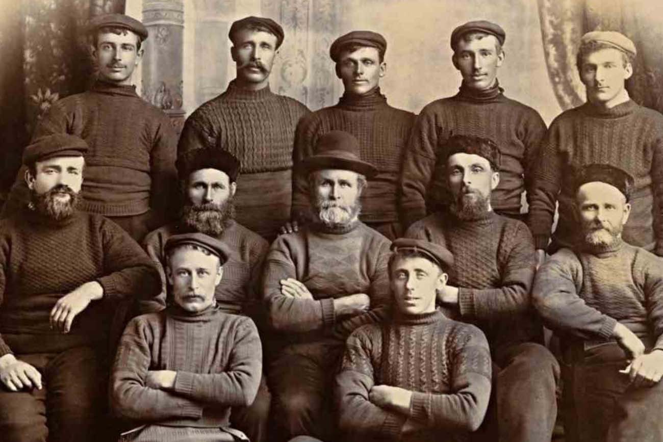 Local Men in a Seaside Town proudly show off their intricately cabled Gansey sweaters.